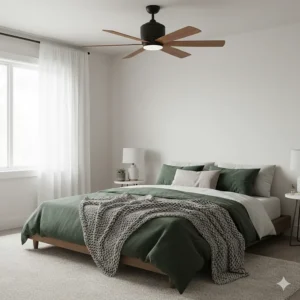A quiet, wood-finish ceiling fan in a minimalist Canadian bedroom with warm wool blankets.