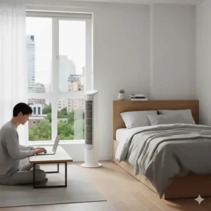 Space-saving tower fan for apartment bedrooms in a compact Vancouver studio layout.