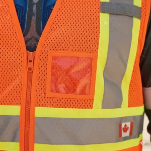 Close-up of durable moisture-wicking fabric on a high visibility cooling vest designed for Canadian summers.