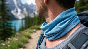 Lightweight evaporative cooling neck gaiter in slate grey, essential for heat management on humid Ontario hiking trails.