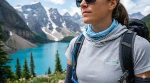 A breathable UV-protection sun hoodie designed to keep hikers cool during high-altitude treks in the Canadian Rockies.