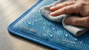 Hand wiping clean the surface of a cooling mat.