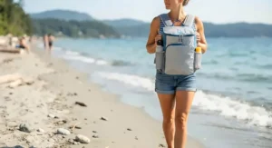 Lightweight backpack cooler for beach walking, featuring ergonomic padded straps and mesh side pockets.