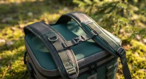Close-up of comfortable, breathable shoulder straps on a lightweight cooler for day hikes.